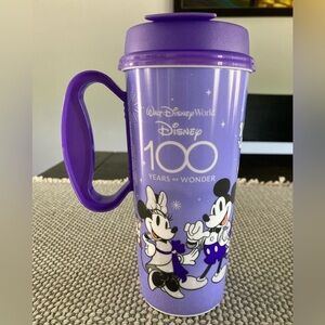 Disney 100 Year Wonder tumbler with lid for hot or cold drinks.